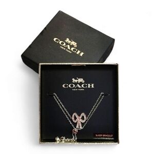 Coach Bow Tie Silver and Pink Pendant Slider Bracelet